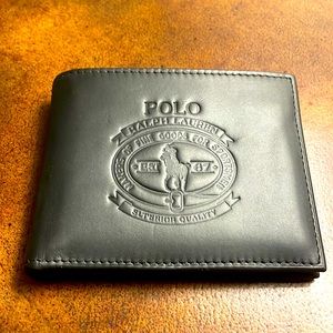 Vintage - never used Polo Ralph Lauren wallet. Good quality/sturdy.